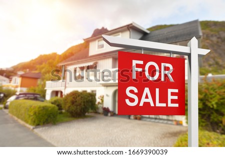 Beautiful urban house with for sale sign