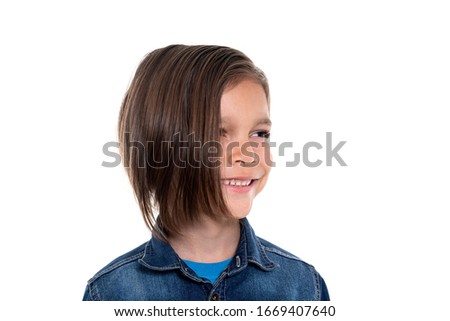smiling little boy on white background