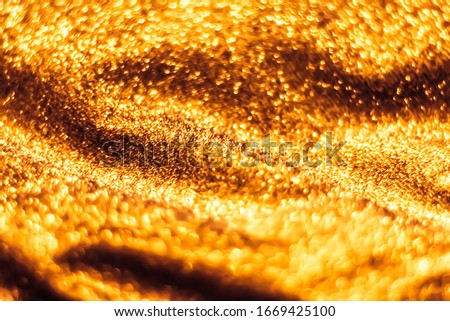 Shiny luxury fabric texture, textile material as holiday background, flat lay