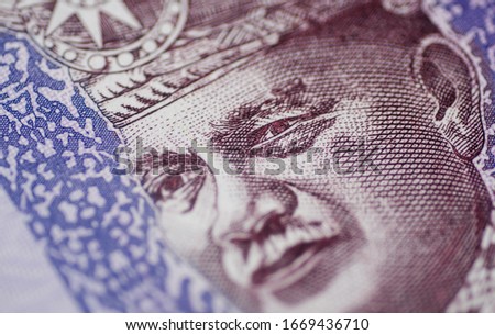 Malaysia currency of Malaysian ringgit banknotes background. Paper money of Hundred ringgit notes on etreme closeup. Financial concept.