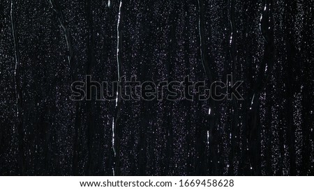 A lot of raindrops of white water falling down. Perfect for digital composing. Pure black background. Royalty-Free Stock Photo #1669458628