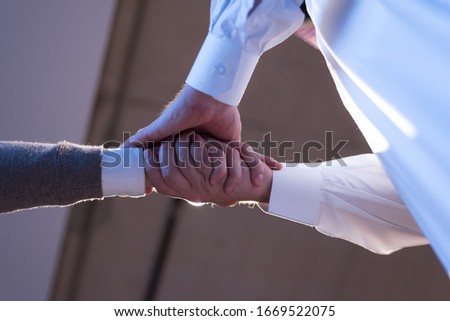 Arab Businessmen's Handshake with American Businessman Descent. Confirmation of Business alliance Partners as WELL. Adhering Respect, Commitment and Integrity in Business Partnership Deal Royalty-Free Stock Photo #1669522075