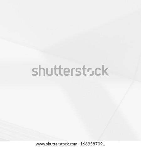 Light and shadow hits the wall of the building. Abstract background.

