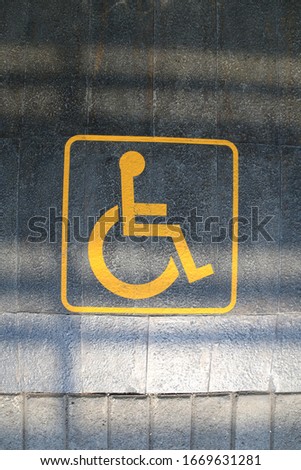 disabled parking sign in the floor