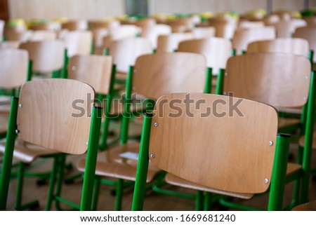 School classroom with many wooden chairs. School concept.
