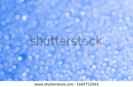 Blue bokeh background caused by steam