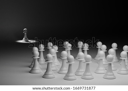 A pawn is excluded by others. Royalty-Free Stock Photo #1669731877