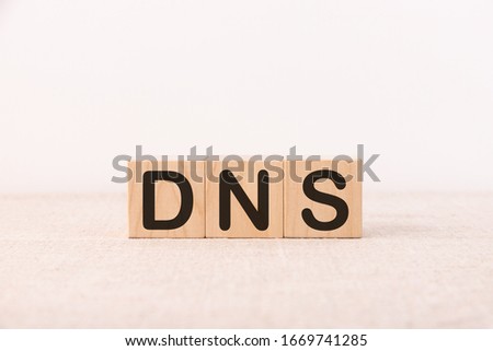 DNS word concept written on a light table and light background
