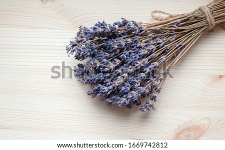 Bright lavander on wooden background with free space