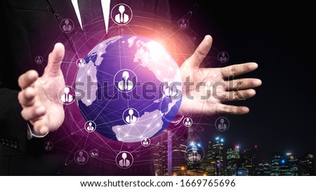 People network and global communication concept. Business people with modern graphic interface of community linking many people around world by social media platform to connect international business. Royalty-Free Stock Photo #1669765696