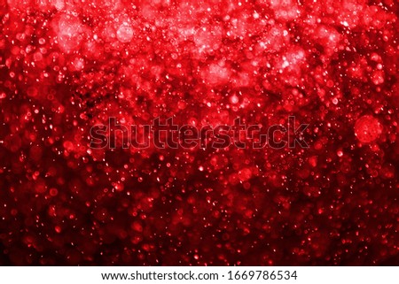 Abstract bokeh background with soft light red  color background Blur wall.