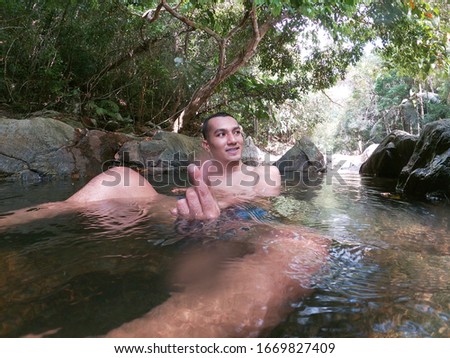 Man at Hinlad waterfall Koh Samui