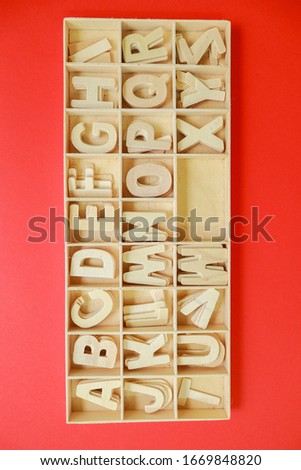 Wooden alphabet for kids to learning.