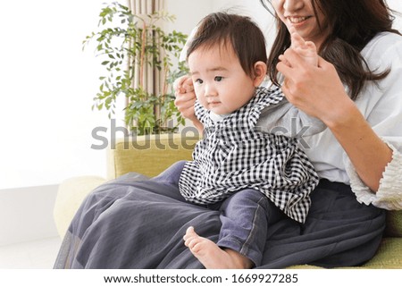 Mom and baby relax at home