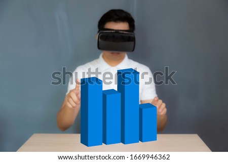 Man wearing the virtual reality goggles touch 3d scene