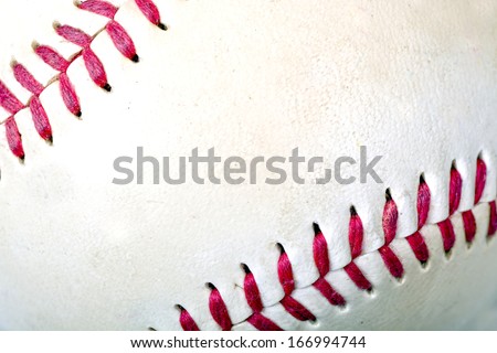 Macro shot of a baseball showing details of the surface