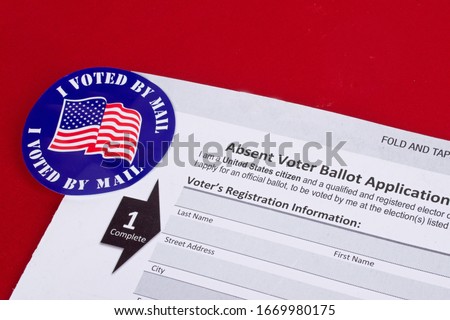 Absent voter ballot application. I voted by mail ￼sticker. Absentee forms.￼ Royalty-Free Stock Photo #1669980175