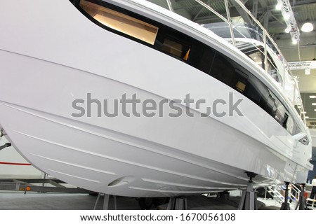 Modern powerful motor boat bottom with bow thruster steering hole and redans Royalty-Free Stock Photo #1670056108