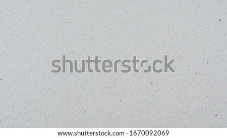 Abstract white recycled paper craft texture background.
Kraft paper gray box pattern seamless.
top view.