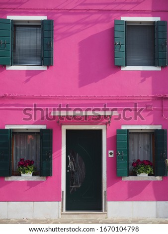 Pink house in Burano, Italy Royalty-Free Stock Photo #1670104798