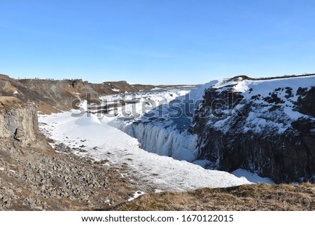 Gullfoss waterfall  in Iceland. Frozen water with snow and ice. Taken in Iceland. 