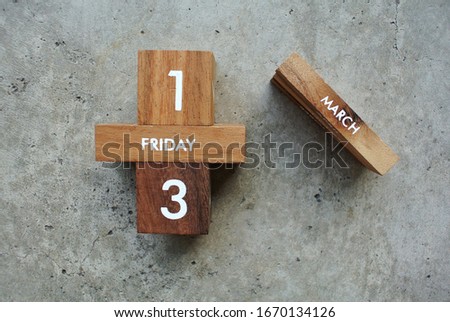 Friday 13th March on wooden calendar. bad luck, Misfortune Day.