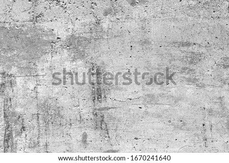 Black white plaster on cement gypsum painted wall. Calm exterior city facade. Coarse grunge, worn blocks background. Uneven overlay surface of stone structure.Retro washed shabby texture for 3d design Royalty-Free Stock Photo #1670241640