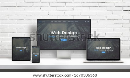 Web design agency concept presentation on displays of different dimensions. Modern flat web design template, theme concept. White brick wall in background