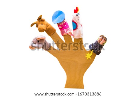 Finger puppets are worn on the fingers of the hand. On white background. In isolation