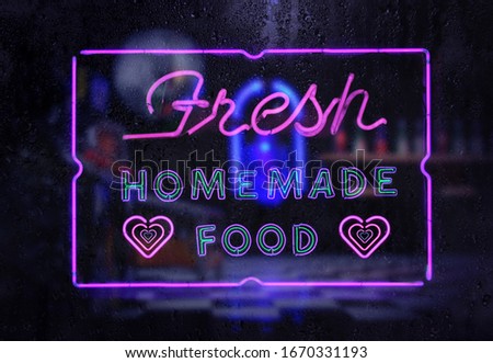Fresh Homemade Food Neon Sign in Rainy Window