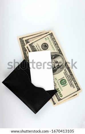 wallet with dollars, gold card and clean business card isolated. place for your text. concept.