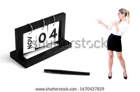 November 4th calendar for business, executives, entrepeneurs and anniversary. Business woman pointing to calendar. Day 4 of month. Birthday card message for print.