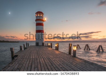 Lighthouse on Neusiedl Lake, Austria at Night Royalty-Free Stock Photo #1670438893