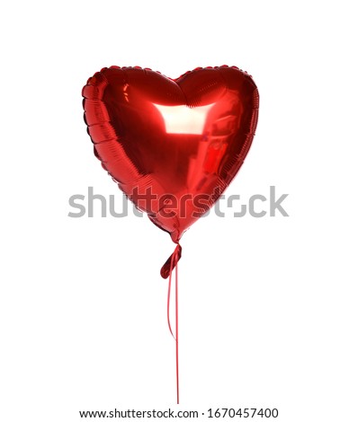 Single red heart balloon object for birthday party or valentines day isolated on a white background