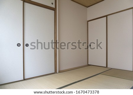 japanese shoji door and tatami in a japanese house Royalty-Free Stock Photo #1670473378