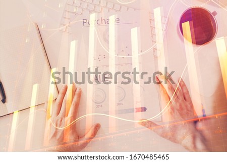 FOREX chart multi exposure with work table background.