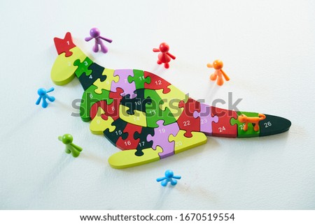Colorful kangaroo puzzle blocks on white background
