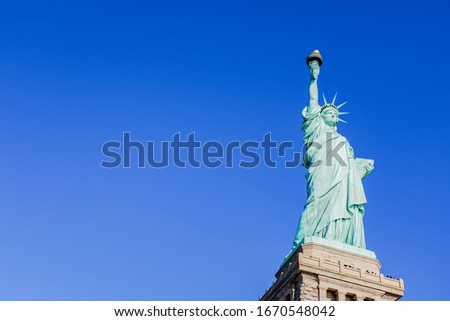 Statue of Liberty under Beautiful Blue Sky. 