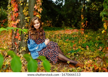 Beautiful woman. Autumn stylish outfit. Adorable lady enjoy sunny autumn day. Fashionable clothes. Femininity and tenderness. Fall fashion. Woman walking in autumn park.