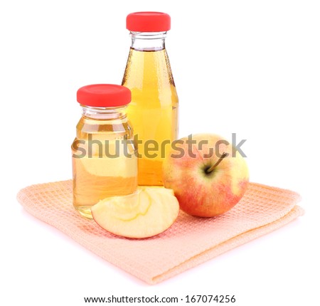 Baby food with apple in glass jars, isolated on white 