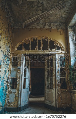 Paint peeling off the walls in abandoned former military barracks, Germany