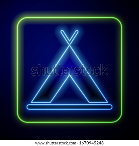 Glowing neon Tourist tent icon isolated on blue background. Camping symbol.  Vector Illustration