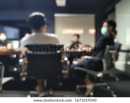 Blurred picture of business people are discussing concept