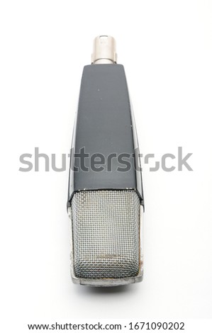 Vintage microphone on an isolated white background