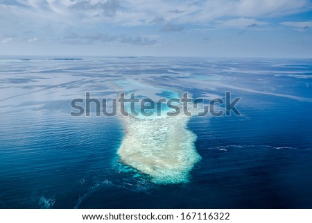 Picture of  typical Maldives island taken from air