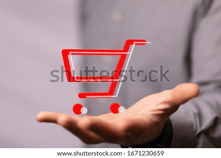 Businessman pressing modern technology panel shopping cart web phone credit card
