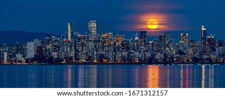 downtown Vancouver with supermoon rise, British Columbia, Canada