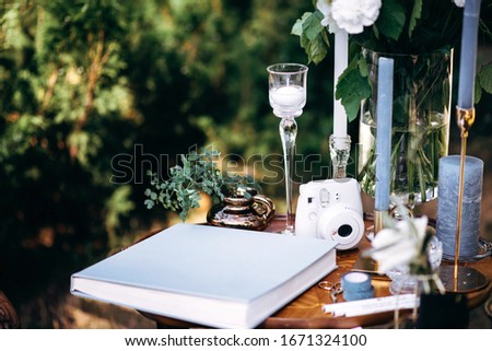 Wedding decoration rustic style. Wedding decor with gift cards and album
