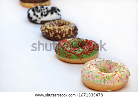 different donuts on a white background