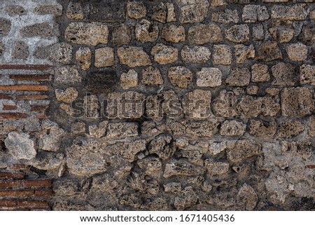 Age coarse shabby city masonry (backdrop). Burnt crumbled scary house cellar.Bumpy vintage facing castle fortress yard for 3D design. Dirty rural facade fortified tower, damp mold destroy ground floor